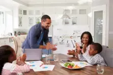 A family spending time together in a dining room